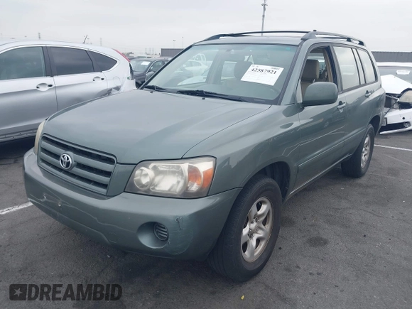 2005 Toyota Highlander with VIN JTEGD21A750108737, listed as a IAAI auction lot 42587921 with 207,233 mi miles and . Bid and sale history available at DreamBid. Image 2.