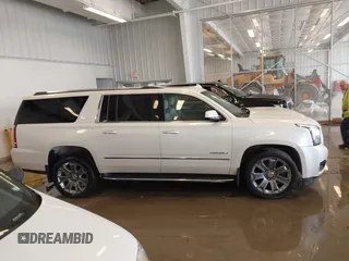 2015 GMC Yukon XL Denali with VIN 1GKS2JKJXFR528927, listed as a IAAI auction lot 41391259 with 159,467 mi miles. Bid and sale history available at carsss.com. Image 13.