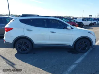 2013 Hyundai Santa Fe 2.0T Sport with VIN 5XYZUDLA9DG116837, listed as a IAAI auction lot 41789420 with 137,708 mi miles. Bid and sale history available at carsss.com. Image 13.
