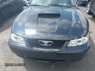 2003 Ford Mustang GT Deluxe z VIN 1FAFP45XX3F417295, wystawiony jako IAAI lot #42229765 z przebiegiem 161 488 mil mil oraz . Historia ofert i sprzedaży dostępna na DreamBid. Obrazek 6.