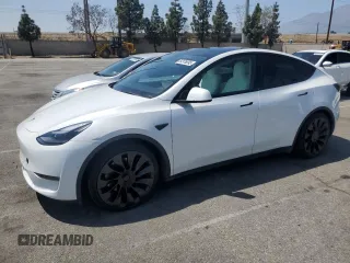 2022 Tesla Model Y Performance with VIN 7SAYGDEFXNF407340, listed as a Copart auction lot 54376895 with 56,709 mi miles and Salvage Title. Bid and sale history available at DreamBid. Image 1.