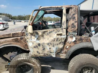 1988 Suzuki Samurai z VIN JS4JC51C6J4271251, wystawiony jako Copart lot #44574795 z przebiegiem 14 542 mil mil oraz Szkody całkowita. Historia ofert i sprzedaży dostępna na DreamBid. Obrazek 7.