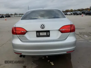 2014 Volkswagen Jetta Sedan S with VIN 3VW2K7AJ0EM311044, listed as a Copart auction lot 85212324 with 128,521 mi miles and Salvage Title. Bid and sale history available at carsss.com. Image 6.
