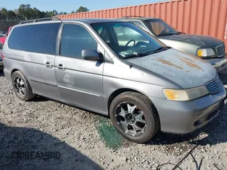 1999 Honda Odyssey EX z VIN 2HKRL1866XH533898, wystawiony jako IAAI lot #41467025 z przebiegiem 284 498 mil mil oraz . Historia ofert i sprzedaży dostępna na DreamBid. Obrazek 1.