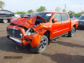 2018 Toyota Tacoma SR with VIN 3TMCZ5AN2JM131276, listed as a IAAI auction lot 42160819 with 46,044 mi miles and . Bid and sale history available at carsss.com. Image 2.