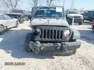 2014 Jeep Wrangler Sport with VIN 1C4AJWAG5EL271318, listed as a IAAI auction lot 41780040 with 128,942 mi miles and . Bid and sale history available at DreamBid. Image 6.
