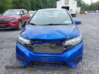 2015 Honda Fit LX with VIN 3HGGK5G59FM711808, listed as a IAAI auction lot 42655848 with 169,780 mi miles and . Bid and sale history available at DreamBid. Image 12.