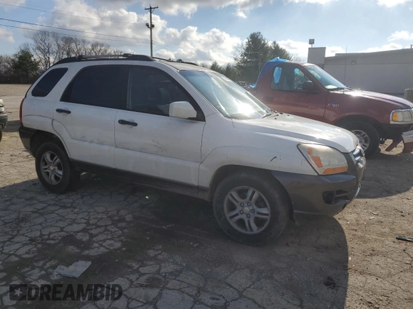 2006 Kia Sportage LX with VIN KNDJF723467205078, listed as a Copart auction lot 86888074 with 231,886 mi miles and Salvage Title. Bid and sale history available at DreamBid. Image 4.