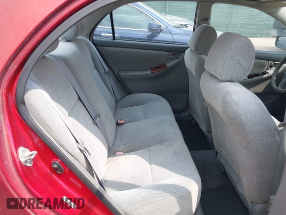 2004 Toyota Corolla CE with VIN 1NXBR32E14Z265397, listed as a IAAI auction lot 42182313 with 200,035 mi miles. Bid and sale history available at carsss.com. Image 8.