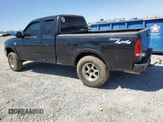 2003 Ford F-150 XL z VIN 2FTRX18W83CB15153, wystawiony jako Copart lot #52976575 z przebiegiem Nie podano mil oraz Szkoda całkowita • Salvage title. Historia ofert i sprzedaży dostępna na DreamBid. Obrazek 2.