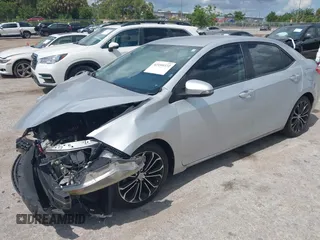 2014 Toyota Corolla L with VIN 5YFBURHE9EP160912, listed as a IAAI auction lot 42159372 with 125,863 mi miles and . Bid and sale history available at DreamBid. Image 2.