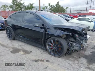 2020 Tesla Model X Long Range with VIN 5YJXCBE22LF283325, listed as a IAAI auction lot 41713545 with 29,371 mi miles. Bid and sale history available at carsss.com. Image 1.