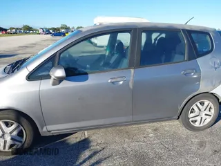 2007 Honda Fit with VIN JHMGD38447S039540, listed as a IAAI auction lot 40985790 with 227,295 mi miles. Bid and sale history available at carsss.com. Image 12.