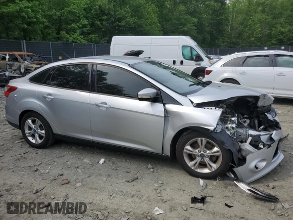 2013 Ford Focus SE with VIN 1FADP3F20DL135626, listed as a Copart auction lot 57207675 with 178,004 mi miles and Salvage title. Bid and sale history available at DreamBid. Image 4.