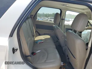 2010 Mercury Mariner Premier with VIN 4M2CN8H70AKJ17236, listed as a Copart auction lot 54974705 with Not provided miles and Salvage title. Bid and sale history available at DreamBid. Image 11.