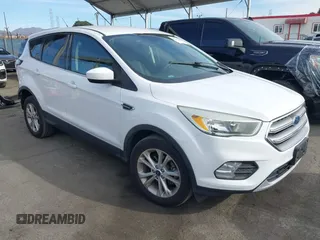 2017 Ford Escape SE z VIN 1FMCU0GD9HUD20265, wystawiony jako IAAI lot #41389092 z przebiegiem 66 778 mil mil oraz . Historia ofert i sprzedaży dostępna na DreamBid. Obrazek 1.