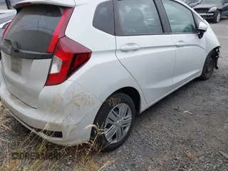 2019 Honda Fit LX with VIN 3HGGK5H40KM737343, listed as a IAAI auction lot 42732609 with 71,343 mi miles and . Bid and sale history available at DreamBid. Image 4.