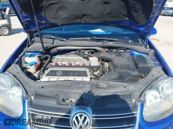 2008 Volkswagen R32 with VIN WVWKC71K88W048072, listed as a IAAI auction lot 42187517 with 162,845 mi miles and . Bid and sale history available at DreamBid. Image 10.