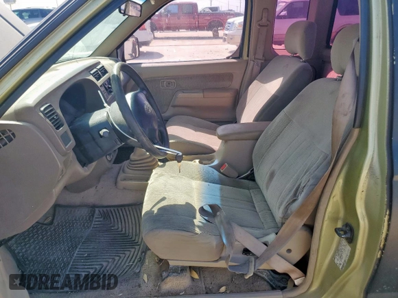 2001 Nissan Frontier XE z VIN 1N6DD21SX1C386232, wystawiony jako Copart lot #52915155 z przebiegiem 174 268 mil mil oraz Czysty tytuł • Clean title. Historia ofert i sprzedaży dostępna na DreamBid. Obrazek 7.