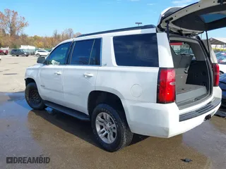 2016 Chevrolet Tahoe LS with VIN 1GNSKAKC2GR408884, listed as a IAAI auction lot 40885051 with 124,858 mi miles. Bid and sale history available at carsss.com. Image 3.