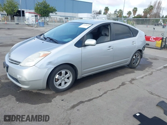 2005 Toyota Prius with VIN JTDKB20U257017611, listed as a IAAI auction lot 42087781 with 263,985 mi miles. Bid and sale history available at carsss.com. Image 2.