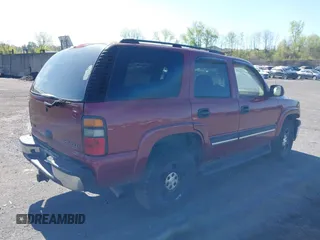 2005 Chevrolet Tahoe LS with VIN 1GNEK13T55J205379, listed as a IAAI auction lot 42143024 with 151,132 mi miles. Bid and sale history available at carsss.com. Image 4.