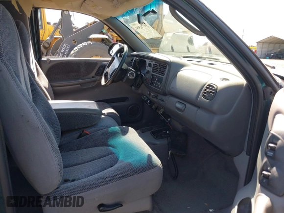 1999 Dodge Dakota SLT with VIN 1B7GG22Y2XS157214, listed as a IAAI auction lot 39776504 with 144,928 mi miles and . Bid and sale history available at carsss.com. Image 5.