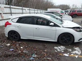 2014 Ford Focus ST with VIN 1FADP3L94EL256548, listed as a IAAI auction lot 40936756 with 79,340 mi miles and . Bid and sale history available at carsss.com. Image 14.