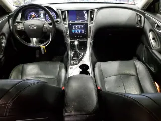 2015 Infiniti Q50 Premium with VIN JN1BV7AP3FM336311, listed as a Copart auction lot 56193875 with 110,984 mi miles and Salvage title. Bid and sale history available at DreamBid. Image 8.