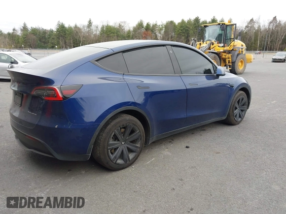 2021 Tesla Model Y Long Range with VIN 5YJYGDEE9MF071120, listed as a IAAI auction lot 40870088 with 73,438 mi miles and . Bid and sale history available at carsss.com. Image 4.