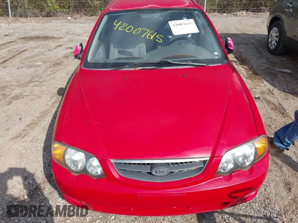 2002 Kia Spectra GS with VIN KNAFB161425076186, listed as a IAAI auction lot 42007615 with 90,269 mi miles. Bid and sale history available at carsss.com. Image 6.