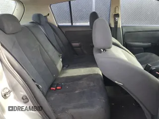 2009 Nissan Versa SL z VIN 3N1BC13E39L482799, wystawiony jako Copart lot #54014035 z przebiegiem 139 248 mil mil oraz Czysty tytuł • Clean title. Historia ofert i sprzedaży dostępna na DreamBid. Obrazek 10.