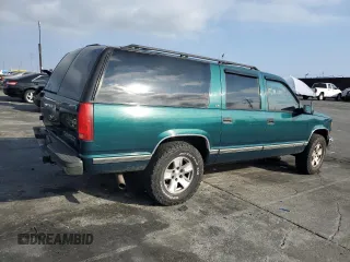 1997 Chevrolet Suburban with VIN 3GNFK16R4VG163602, listed as a Copart auction lot 76081984 with 243,169 mi miles and Salvage Title. Bid and sale history available at carsss.com. Image 3.