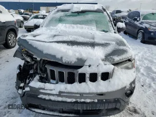 2011 Jeep Compass Latitude with VIN 1J4NT1FA8BD224478, listed as a Copart auction lot 45090345 with 142,051 mi miles and Salvage Title. Bid and sale history available at carsss.com. Image 5.
