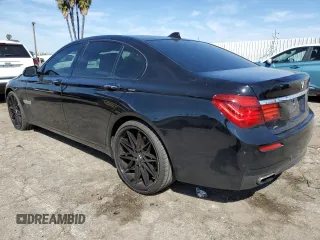 2015 BMW 7 Series 740i с VIN WBAYA6C58FD827009, выставлен на аукционе Copart как лот 50223755 с пробегом 105 440 миль миль и Списание • Salvage title. История ставок и продаж доступна на DreamBid. Изображение 2.