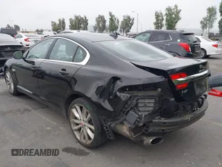 2015 Jaguar XF V6 Portfolio with VIN SAJWA0F77F8U65737, listed as a IAAI auction lot 42078529 with 62,229 mi miles. Bid and sale history available at carsss.com. Image 3.