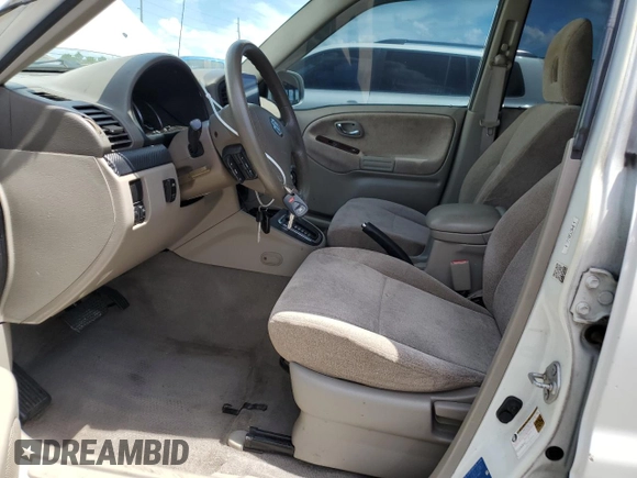 2004 Suzuki XL7 LX with VIN JS3TX92V444107106, listed as a Copart auction lot 62322035 with 94,380 mi miles and Salvage title. Bid and sale history available at DreamBid. Image 7.