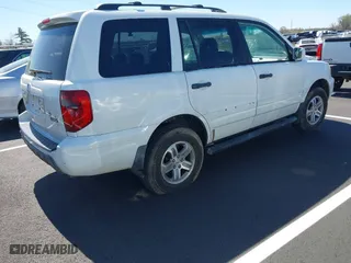 2003 Honda Pilot EX with VIN 2HKYF18693H511343, listed as a IAAI auction lot 41833640 with 300,640 mi miles. Bid and sale history available at carsss.com. Image 4.
