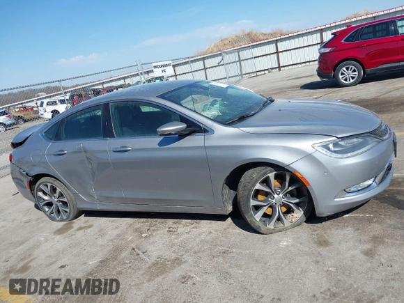 2015 Chrysler 200 C with VIN 1C3CCCCG0FN509701, listed as a IAAI auction lot 41873084 with Not Provided miles and . Bid and sale history available at carsss.com. Image 13.