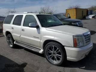 2004 Cadillac Escalade z VIN 1GYEC63T44R185526, wystawiony jako Copart lot #50969335 z przebiegiem 129 386 mil mil oraz Szkoda całkowita • Salvage title. Historia ofert i sprzedaży dostępna na DreamBid. Obrazek 4.