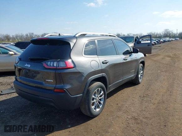 2019 Jeep Cherokee Latitude Plus with VIN 1C4PJMLBXKD162570, listed as a IAAI auction lot 41897313 with 142,110 mi miles. Bid and sale history available at carsss.com. Image 4.