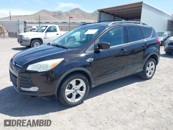 2013 Ford Escape SE z VIN 1FMCU9GX4DUC94117, wystawiony jako IAAI lot #42394333 z przebiegiem 261 392 mil mil oraz . Historia ofert i sprzedaży dostępna na DreamBid. Obrazek 2.