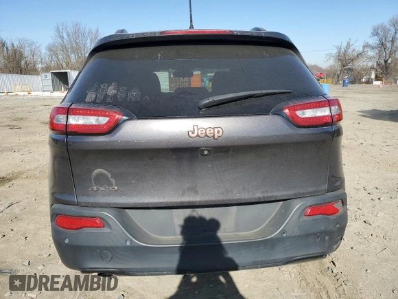 2016 Jeep Cherokee Latitude with VIN 1C4PJMCB1GW282771, listed as a Copart auction lot 49448725 with 115,250 mi miles and Salvage Title. Bid and sale history available at carsss.com. Image 6.