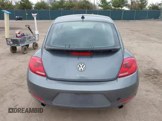 2012 Volkswagen Beetle with VIN 3VWV67AT0CM663718, listed as a IAAI auction lot 41860510 with 99,932 mi miles and . Bid and sale history available at DreamBid. Image 17.