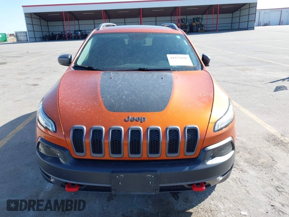 2016 Jeep Cherokee Trailhawk with VIN 1C4PJMBBXGW251682, listed as a IAAI auction lot 41973696 with 100,411 mi miles. Bid and sale history available at carsss.com. Image 13.