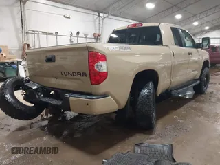 2017 Toyota Tundra SR z VIN 5TFUY5F19HX583033, wystawiony jako IAAI lot #41484920 z przebiegiem 112 206 mil mil oraz . Historia ofert i sprzedaży dostępna na DreamBid. Obrazek 4.