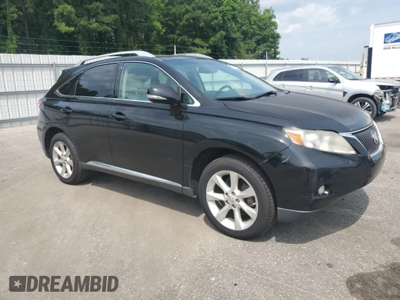 2011 Lexus RX 350 with VIN 2T2ZK1BA2BC049590, listed as a Copart auction lot 62101415 with 200,971 mi miles and Clean title. Bid and sale history available at DreamBid. Image 4.