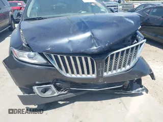 2014 Lincoln MKX with VIN 2LMDJ6JK8EBL13191, listed as a IAAI auction lot 42023811 with 212,793 mi miles. Bid and sale history available at carsss.com. Image 6.