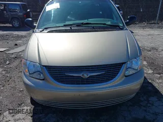 2002 Chrysler Town & Country EX with VIN 2C8GP74LX2R573857, listed as a IAAI auction lot 41846302 with Not Provided miles and . Bid and sale history available at carsss.com. Image 11.