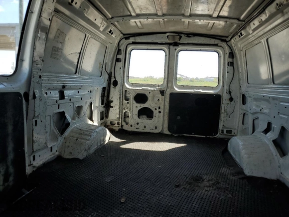 2008 Ford Econoline Cargo Commercial with VIN 1FTNE14W98DB42024, listed as a Copart auction lot 45402915 with 3,667,887 mi miles and Salvage Title. Bid and sale history available at carsss.com. Image 10.
